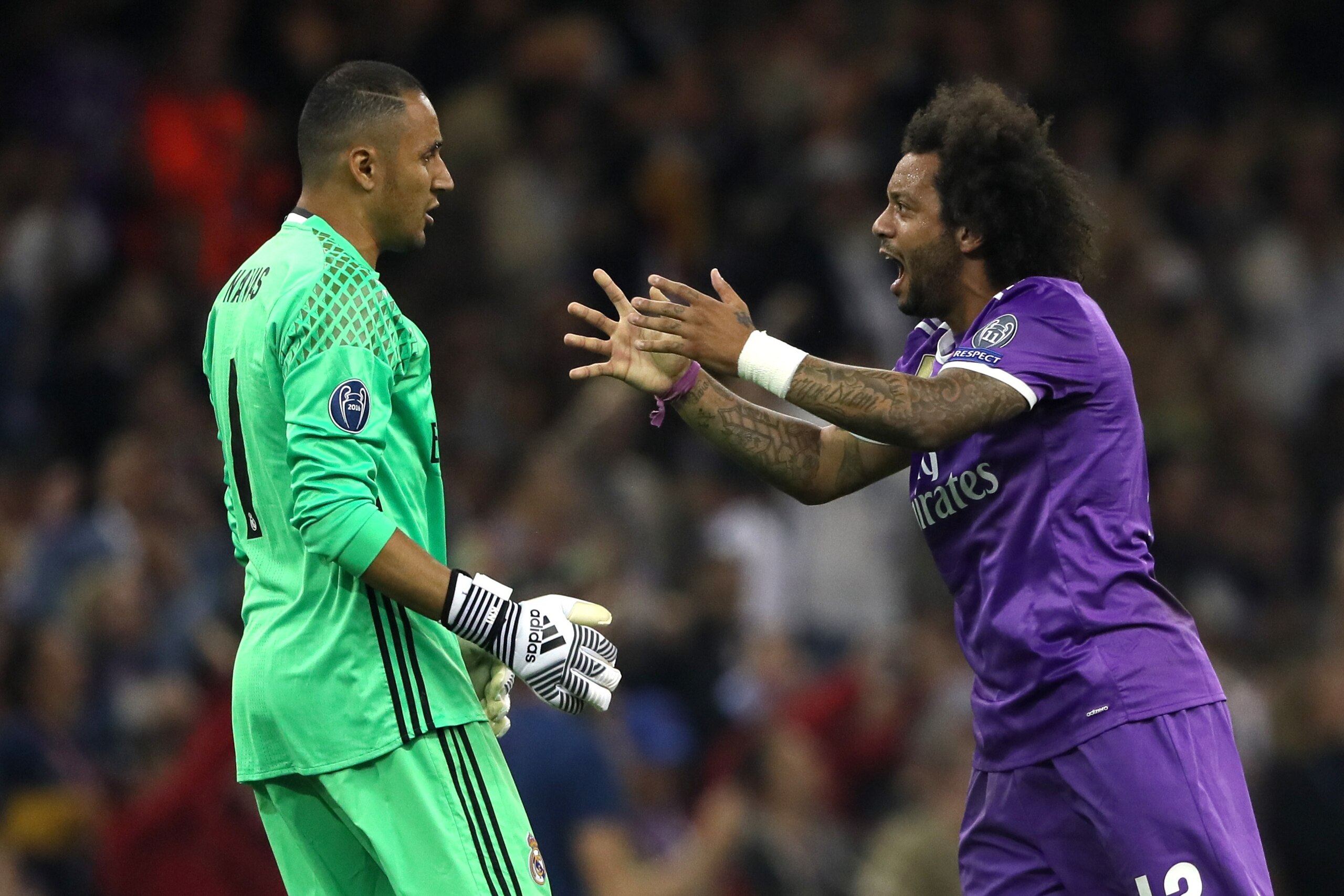 CARDIFF, WALES - JUNE 03:  Keylor Navas and Marcelo of Real Madrid celebrate during the UEFA Champions League Final between Juventus and Real Madrid at National Stadium of Wales on June 3, 2017 in Cardiff, Wales.  (Photo by Matthew Ashton - AMA/Getty Imag
