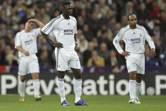 MADRID, SPAIN - NOVEMBER 21: Mahamadou Diarra of Real Madrid reacts after Lyon scored their second goal during the UEFA Champions League Group E match between Real Madrid and Olympique Lyon at the Santiago Bernabeu stadium on November 21, 2006 in Madrid, 