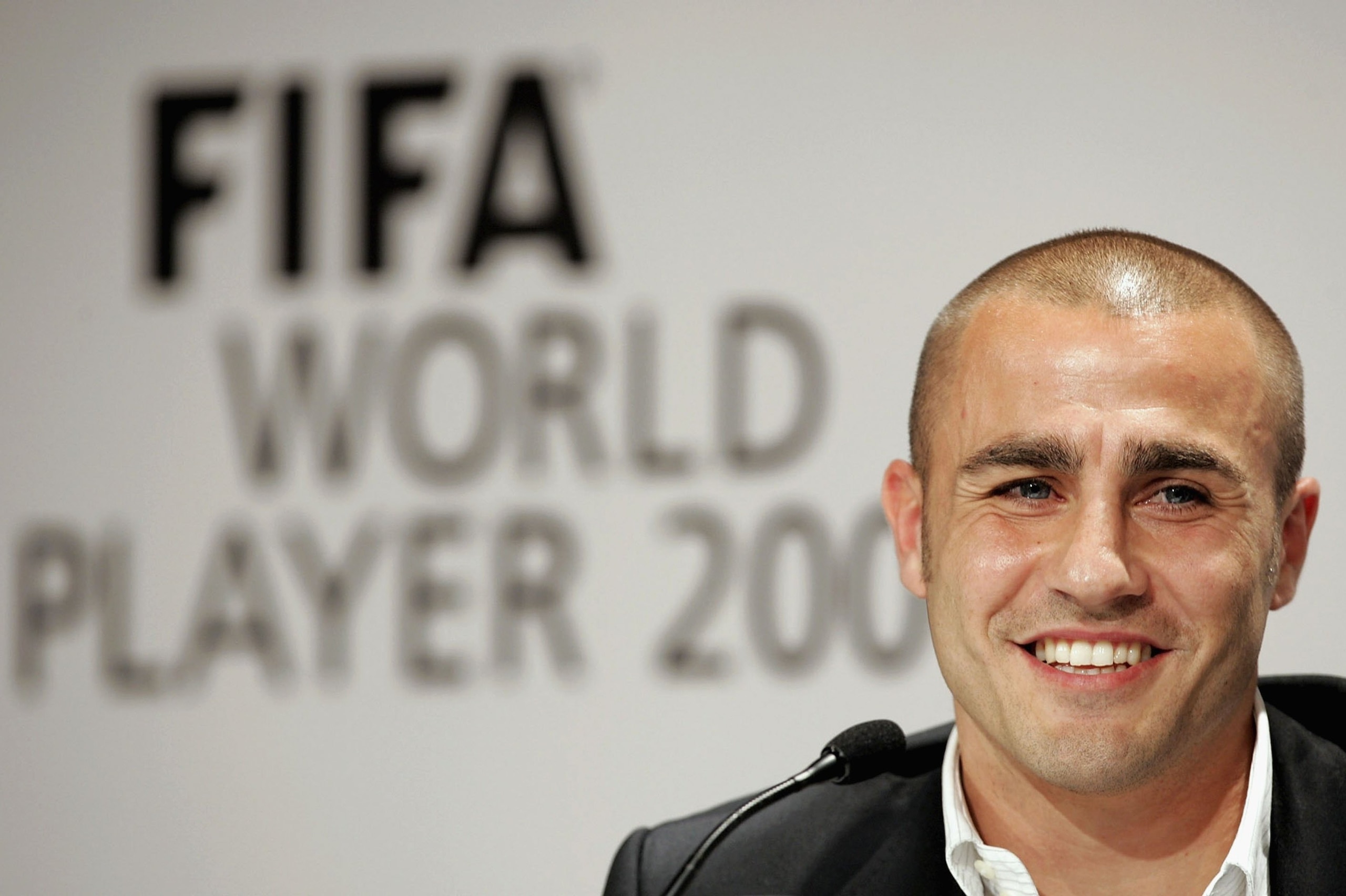 ZURICH, SWITZERLAND - DECEMBER 18:  Fabio Cannavaro of Italy and Real Madrid speaks to the media during a press conference prior to the FIFA World Player of the Year Awards ceremony at the Zurich Opera House on December 18, 2006 in Zurich, Switzerland.  (