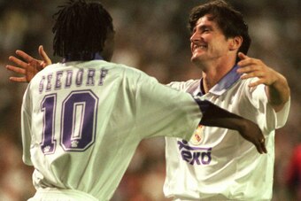Seedorf embracing Suker