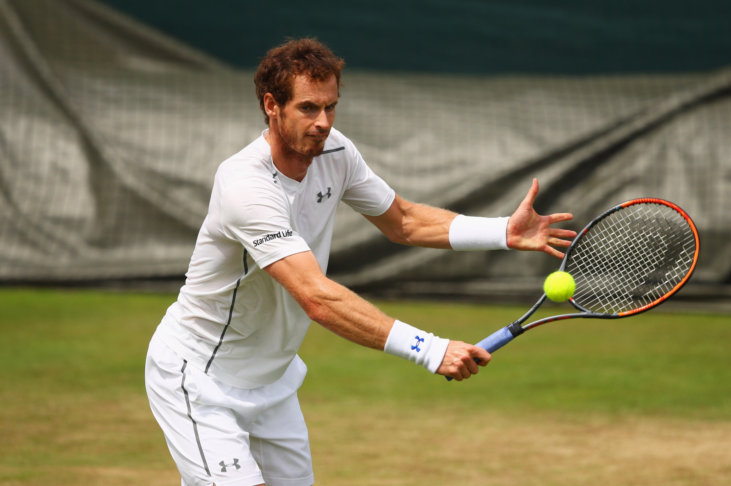LONDON, ENGLAND - JUNE 30:  Andy Murray of Great Britain plays a backhand during practice ahead of Wimbledon Lawn Tennis Championships at the All England Lawn Tennis and Croquet Club on June 30, 2017 in London, England.  (Photo by Clive Brunskill/Getty Im