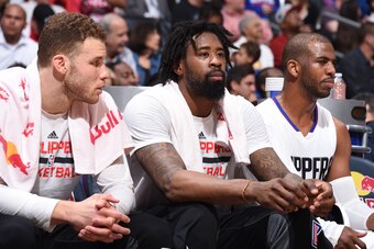 LOS ANGELES, CA - MARCH 29: DeAndre Jordan #6, Blake Griffin #32 and Chris Paul #3 of the Los Angeles Clippers look on during the game against the Washington Wizards on March 29, 2017 at STAPLES Center in Los Angeles, California. NOTE TO USER: User expres