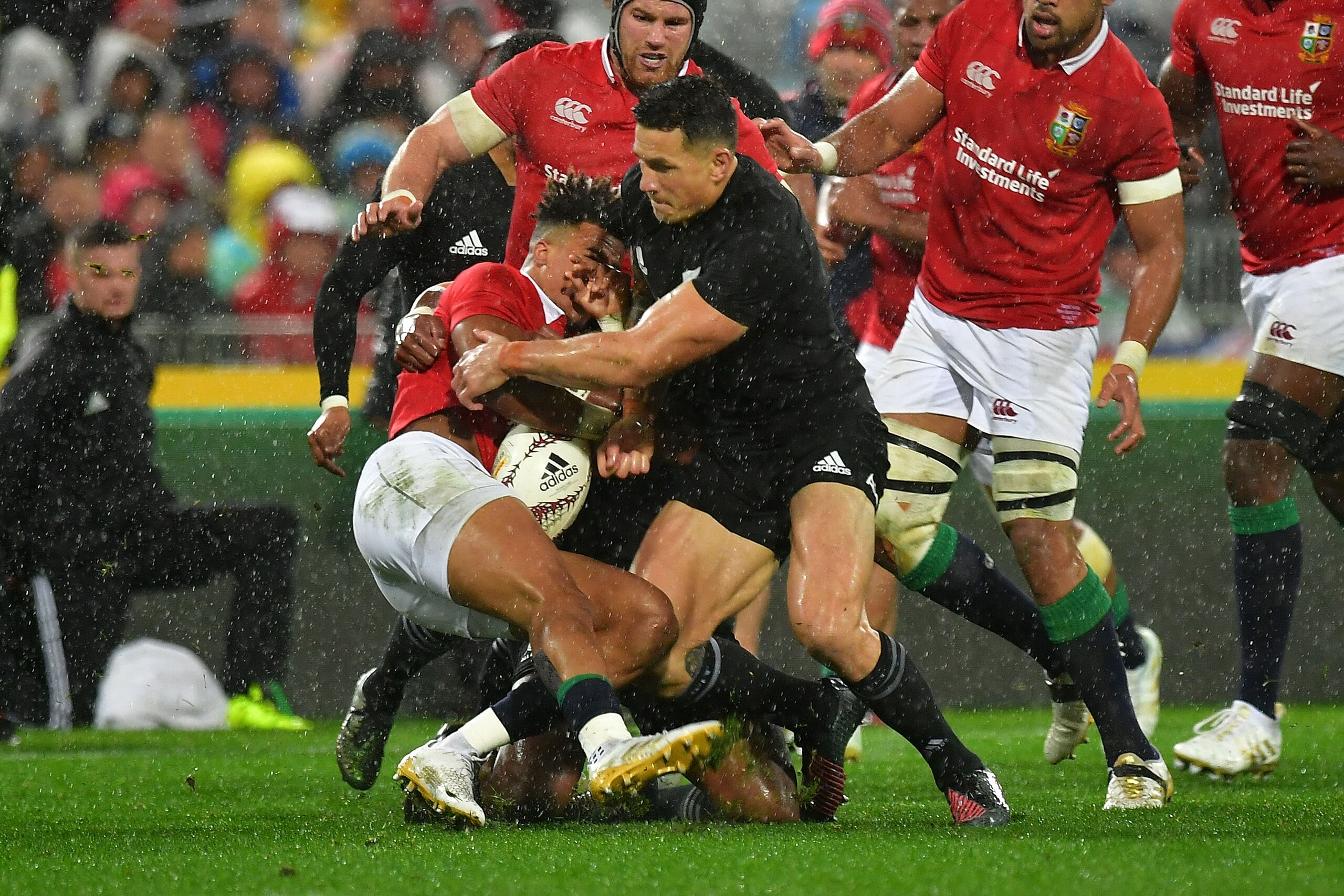 British and Irish Lions' Anthony Watson (L) is tackled by New Zealand All Blacks' Sonny Bill Williams during the second rugby union Test between the British and Irish Lions and the New Zealand All Blacks in Wellington on July 1, 2017.
All Blacks centre So