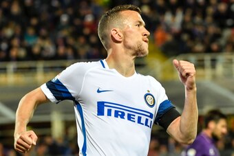 Inter Milan's forward from Croatia Ivan Perisic celebrates after scoring during the Italian Serie A football match Fiorentina vs Inter Milan, on April 22, 2017 at Florence's 'Artemio Franchi' communal stadium. / AFP PHOTO / ANDREAS SOLARO        (Photo cr