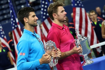 NEW YORK, NY - SEPTEMBER 11: Finalist Novak Djokovic of Serbia and winner Stan Wawrinka of Switzerland pose during the trophy presentation following the men's final at Arthur Ashe Stadium on day 14 of the 2016 US Open at USTA Billie Jean King National Ten