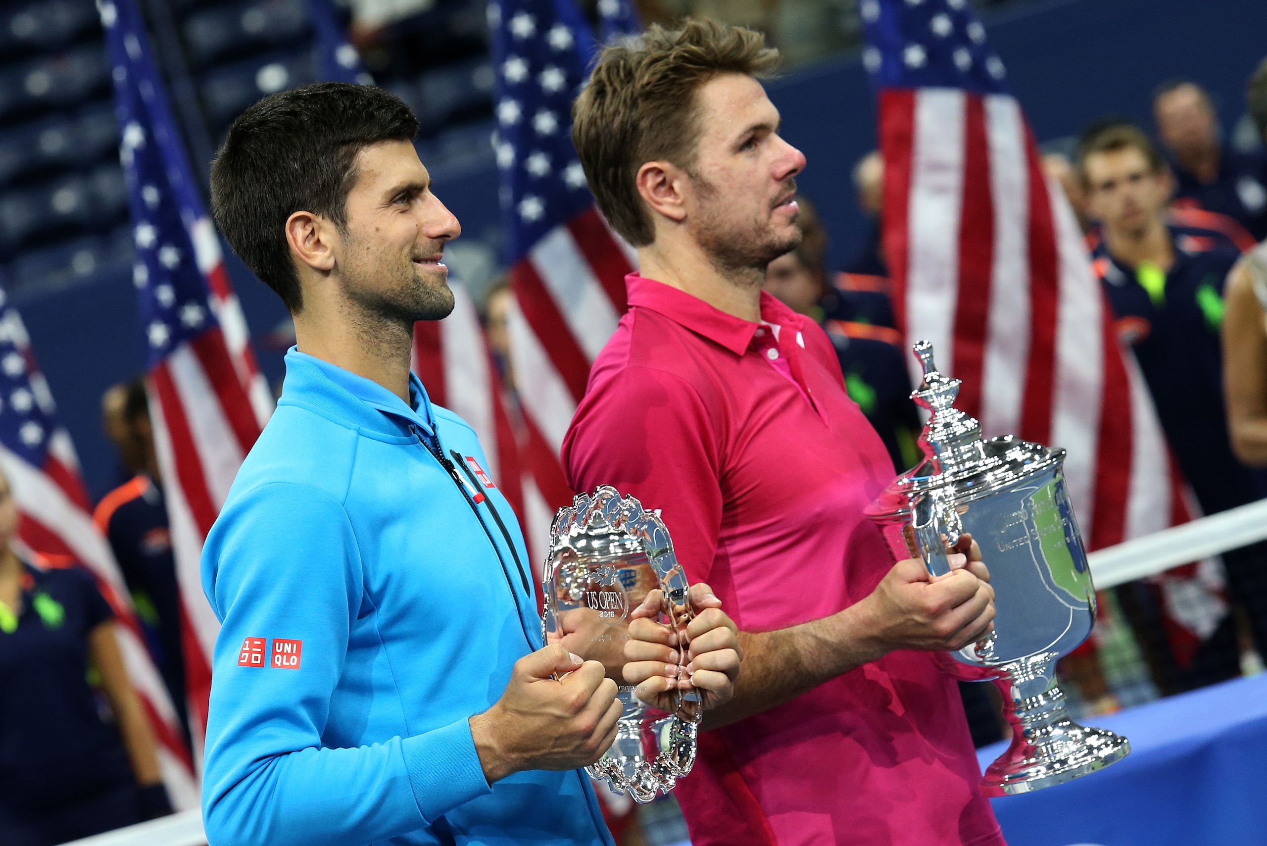 NEW YORK, NY - SEPTEMBER 11: Finalist Novak Djokovic of Serbia and winner Stan Wawrinka of Switzerland pose during the trophy presentation following the men's final at Arthur Ashe Stadium on day 14 of the 2016 US Open at USTA Billie Jean King National Ten