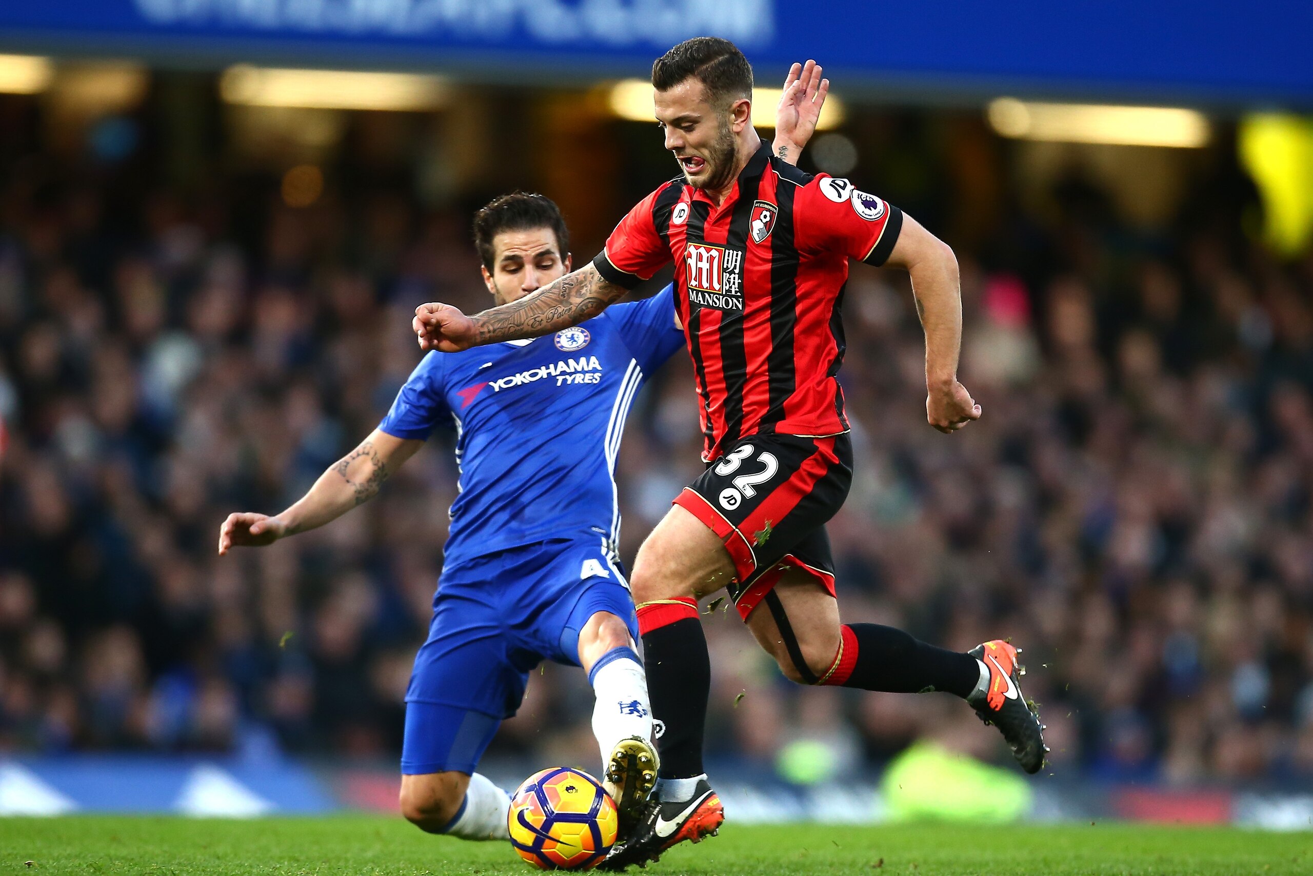 LONDON, ENGLAND - DECEMBER 26:  Cesc Fabregas of Chelsea tackles Jack Wilshere of AFC Bournemouth during the Premier League match between Chelsea and AFC Bournemouth at Stamford Bridge on December 26, 2016 in London, England.  (Photo by Jordan Mansfield/G