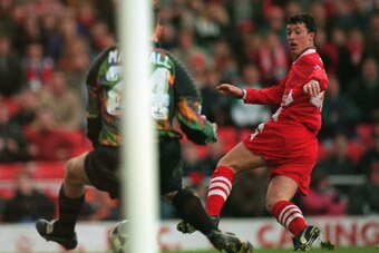 2 JAN 1995:  ROBBIE FOWLER OF LIVERPOOL PUSHES THE BALL PAST ANDY MARSHALL OF NORWICH CITY DURING THE FA PREMIER LEAGUE MATCH AT ANFIELD. LIVERPOOL V NORWICH CITY Mandatory Credit: Clive Brunskill/ALLSPORT