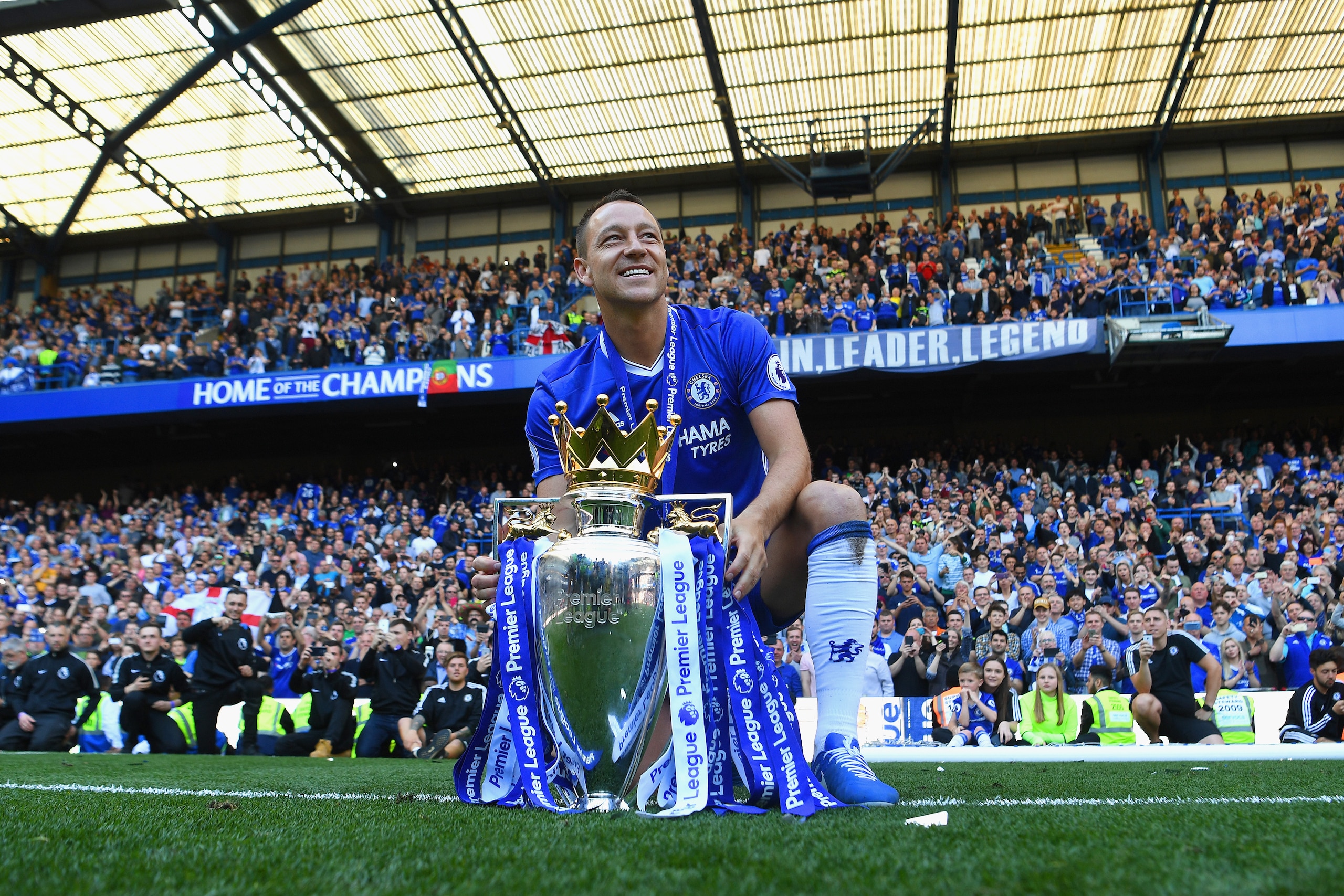 LONDON, ENGLAND - MAY 21:  John Terry of Chelsea poses with the Premier League Trophy after the Premier League match between Chelsea and Sunderland at Stamford Bridge on May 21, 2017 in London, England.  (Photo by Michael Regan/Getty Images)