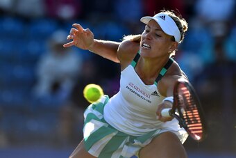 Germany's Angelique Kerber plays a shot against Britain's Johanna Konta during their women's singles quarter-finals tennis match at the ATP Aegon International tennis tournament in Eastbourne, southern England, on June 29, 2017. / AFP PHOTO / Glyn KIRK   