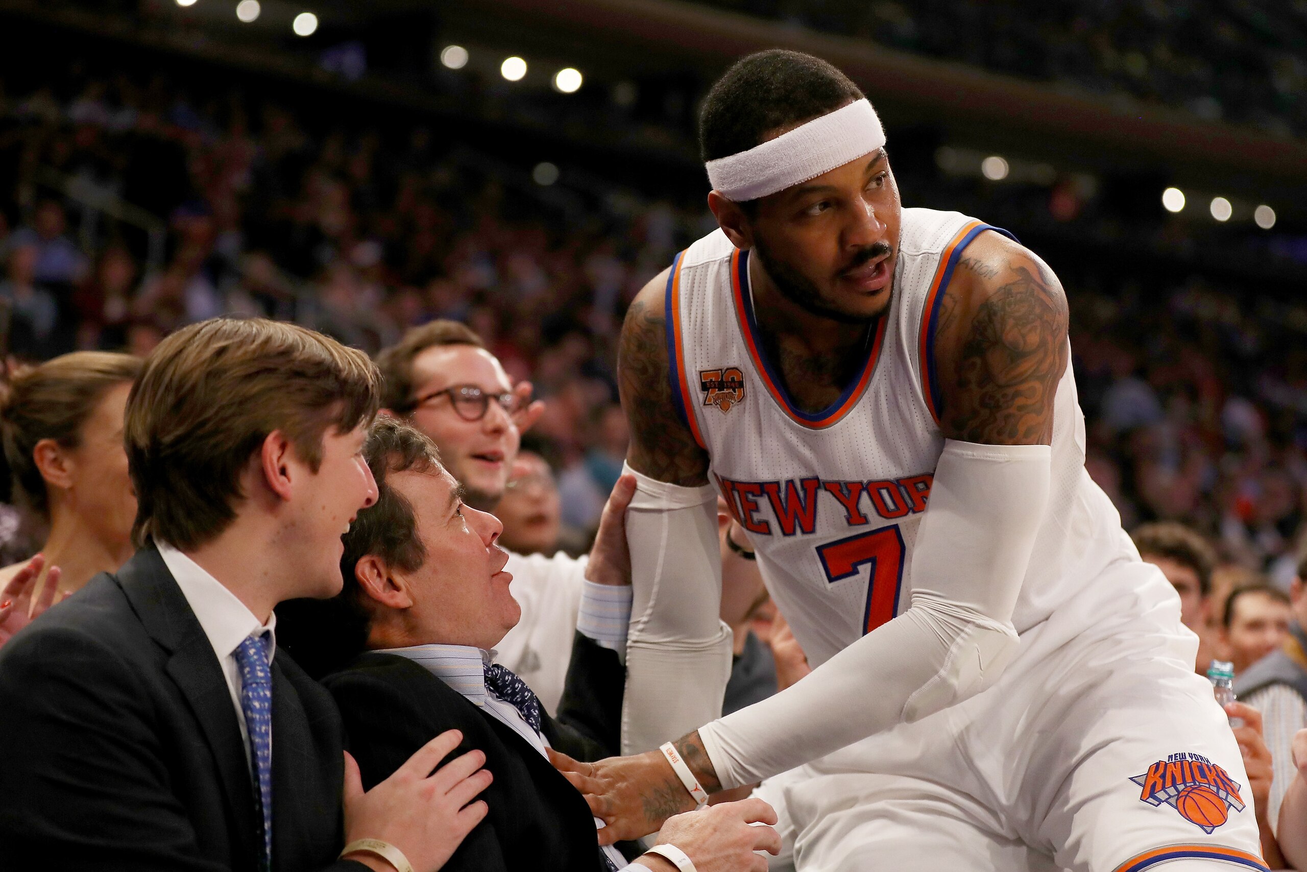 NEW YORK, NY - APRIL 12: Carmelo Anthony #7 of the New York Knicks falls into the crowd as he goes after a ball in the first quarter against the Philadelphia 76ers at Madison Square Garden on April 12, 2017 in New York City. NOTE TO USER: User expressly NEW YORK, NY - APRIL 12: Carmelo Anthony #7 of the New York Knicks falls into the crowd as he goes after a ball in the first quarter against the Philadelphia 76ers at Madison Square Garden on April 12, 2017 in New York City. NOTE TO USER: User expressly