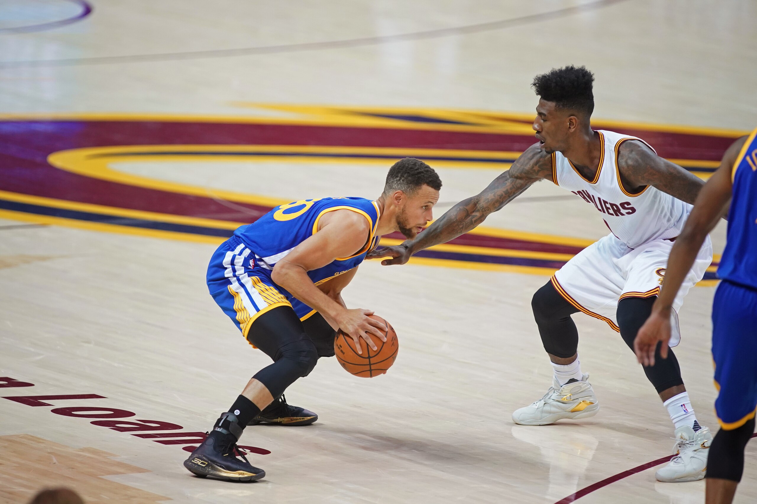 CLEVELAND, OH - JUNE 09: Stephen Curry #30 of the Golden State Warriors dribbles the ball while guarded by Iman Shumpert #4 of the Cleveland Cavaliers in Game Four of the 2017 NBA Finals on June 9, 2017 at Quicken Loans Arena in Cleveland, Ohio. NOTE TO CLEVELAND, OH - JUNE 09: Stephen Curry #30 of the Golden State Warriors dribbles the ball while guarded by Iman Shumpert #4 of the Cleveland Cavaliers in Game Four of the 2017 NBA Finals on June 9, 2017 at Quicken Loans Arena in Cleveland, Ohio. NOTE TO