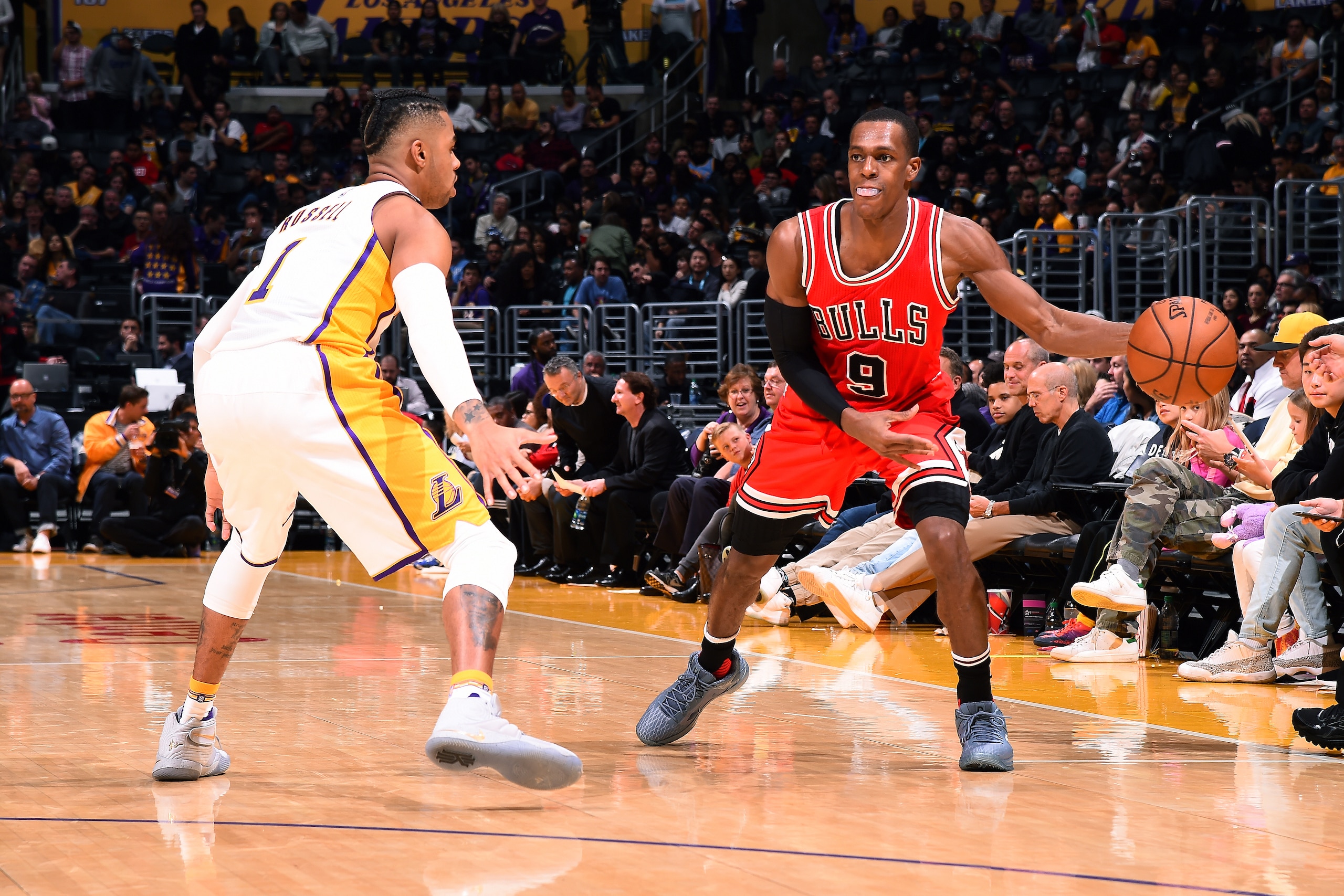 LOS ANGELES, CA - NOVEMBER 20: Rajon Rondo #9 of the Chicago Bulls passes the ball during the game against D'Angelo Russell #1 of the Los Angeles Lakers on November 20, 2016 at STAPLES Center in Los Angeles, California. NOTE TO USER: User expressly acknow