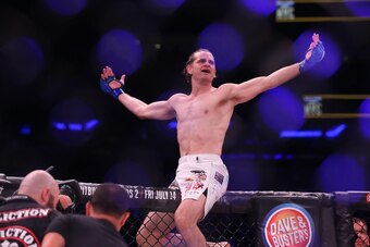 Jun 24, 2017; New York, NY, USA; Zach Freeman (blue gloves) reacts to fight against Aaron Pico (red gloves) during Bellator NYC at Madison Square Garden. Mandatory Credit: Ed Mulholland-USA TODAY Sports