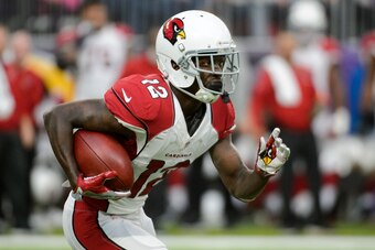 MINNEAPOLIS, MN - NOVEMBER 20: John Brown #12 of the Arizona Cardinals carries the ball against the Minnesota Vikings during the game on November 20, 2016 at US Bank Stadium in Minneapolis, Minnesota. (Photo by Hannah Foslien/Getty Images)