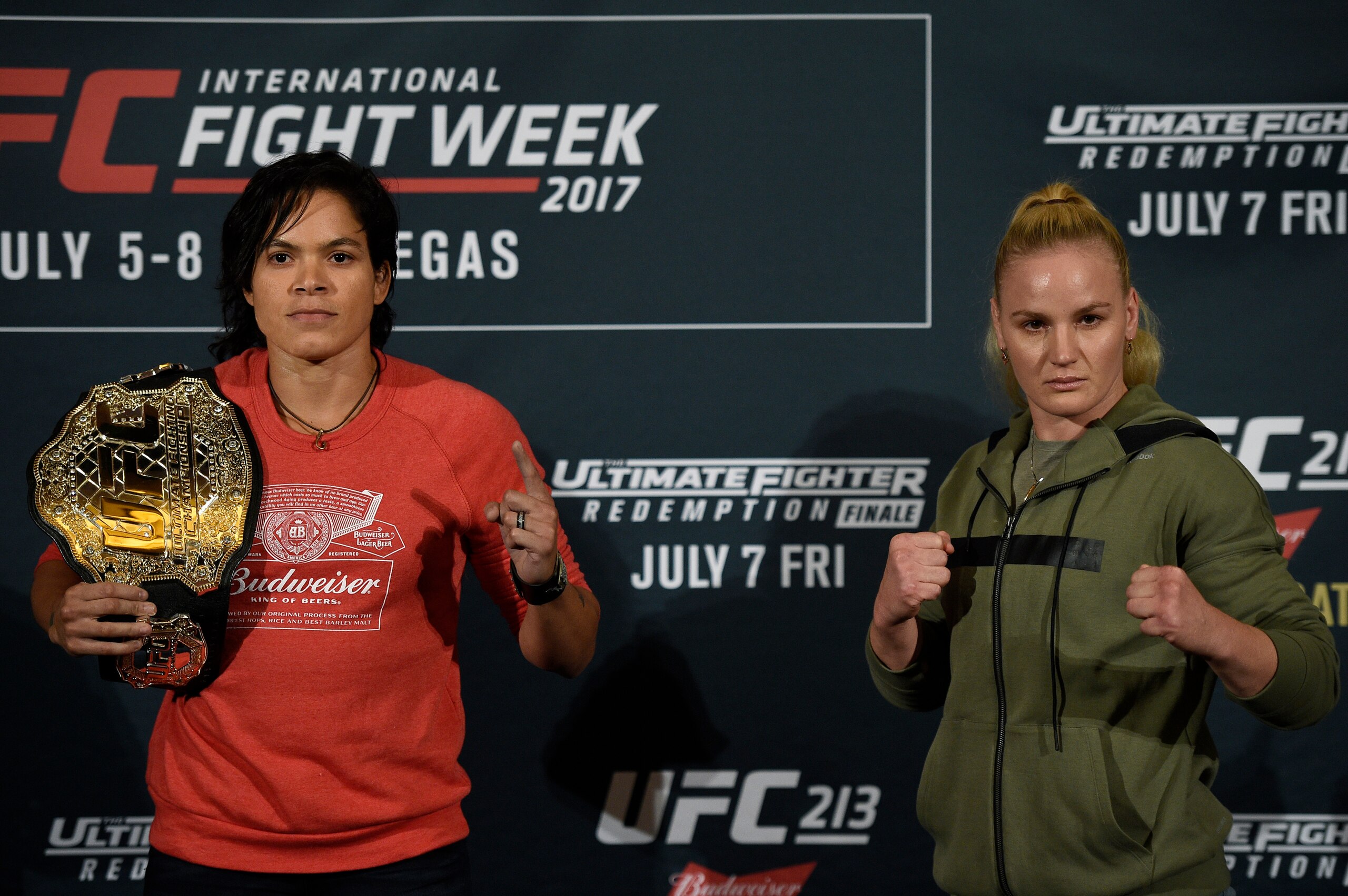 LOS ANGELES, CA - JUNE 29: Amanda Nunes (L), UFC bantamweight champion, poses with her belt as she faces face off with challenger Valentina Shevchenko during the UFC International Fight Week Media Day June 29, 2017, in Los Angeles, California. (Photo by K