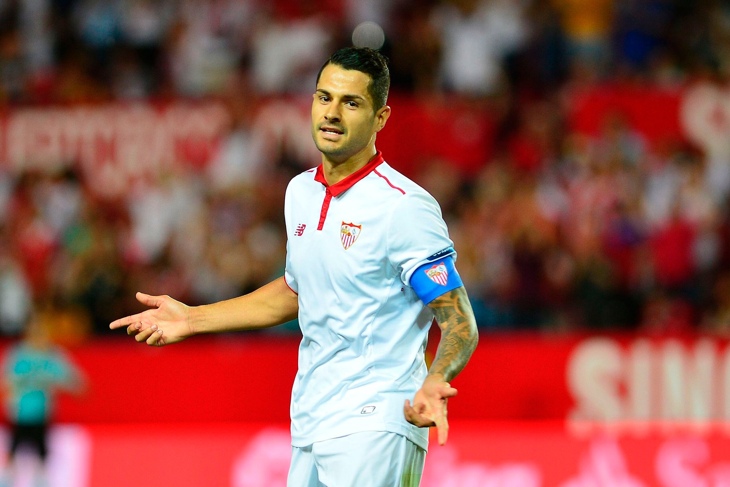 Sevilla's midfielder Vitolo celebrates after scoring a goal during the Spanish league football match Sevilla FC vs CA Osasuna at the Ramon Sanchez Pizjuan stadium in Sevilla on May 20, 2017. / AFP PHOTO / CRISTINA QUICLER        (Photo credit should read 
