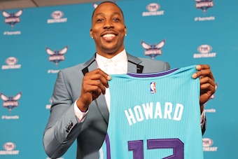 CHARLOTTE, NC- JUNE 26: Dwight Howard #12 of the Charlotte Hornets poses for a photo during a press conference at the Spectrum Center in Charlotte, North Carolina on June 26, 2017. NOTE TO USER: User expressly acknowledges and agrees that, by downloading CHARLOTTE, NC- JUNE 26: Dwight Howard #12 of the Charlotte Hornets poses for a photo during a press conference at the Spectrum Center in Charlotte, North Carolina on June 26, 2017. NOTE TO USER: User expressly acknowledges and agrees that, by downloading