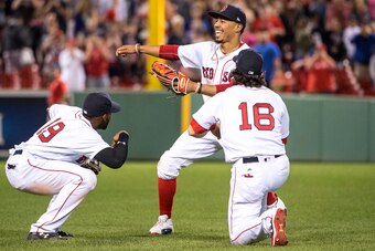 Mookie Betts (center) says baseball is "just as cool as all the rest" of the major sports.