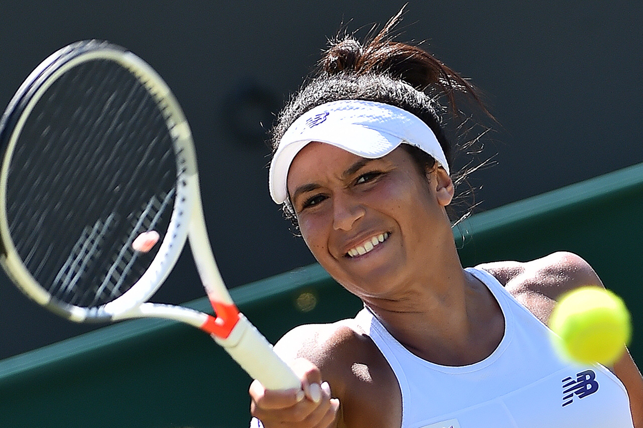 Britain's Heather Watson returns against Latvia's Anastasija Sevastova during their women's singles second round match on the third day of the 2017 Wimbledon Championships at The All England Lawn Tennis Club in Wimbledon, southwest London, on July 5, 2017 Britain's Heather Watson returns against Latvia's Anastasija Sevastova during their women's singles second round match on the third day of the 2017 Wimbledon Championships at The All England Lawn Tennis Club in Wimbledon, southwest London, on July 5, 2017