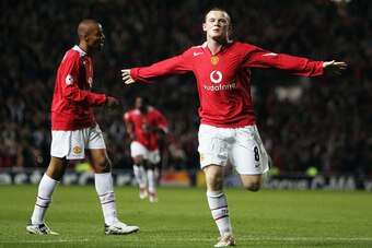MANCHESTER, ENGLAND - SEPTEMBER 28:  Wayne Rooney of Manchester United celebrates his second goal during the UEFA Champions League Group D match between Manchester United and Fenerbahce SK at Old Trafford on September 28, 2004 in Manchester, England.  (Ph