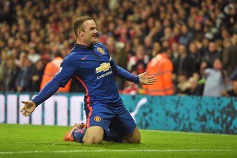 LONDON, ENGLAND - NOVEMBER 22:  Wayne Rooney of Manchester United celebrates scoring his team's second goal during the Barclays Premier League match between Arsenal and Manchester United at Emirates Stadium on November 22, 2014 in London, England.  (Photo