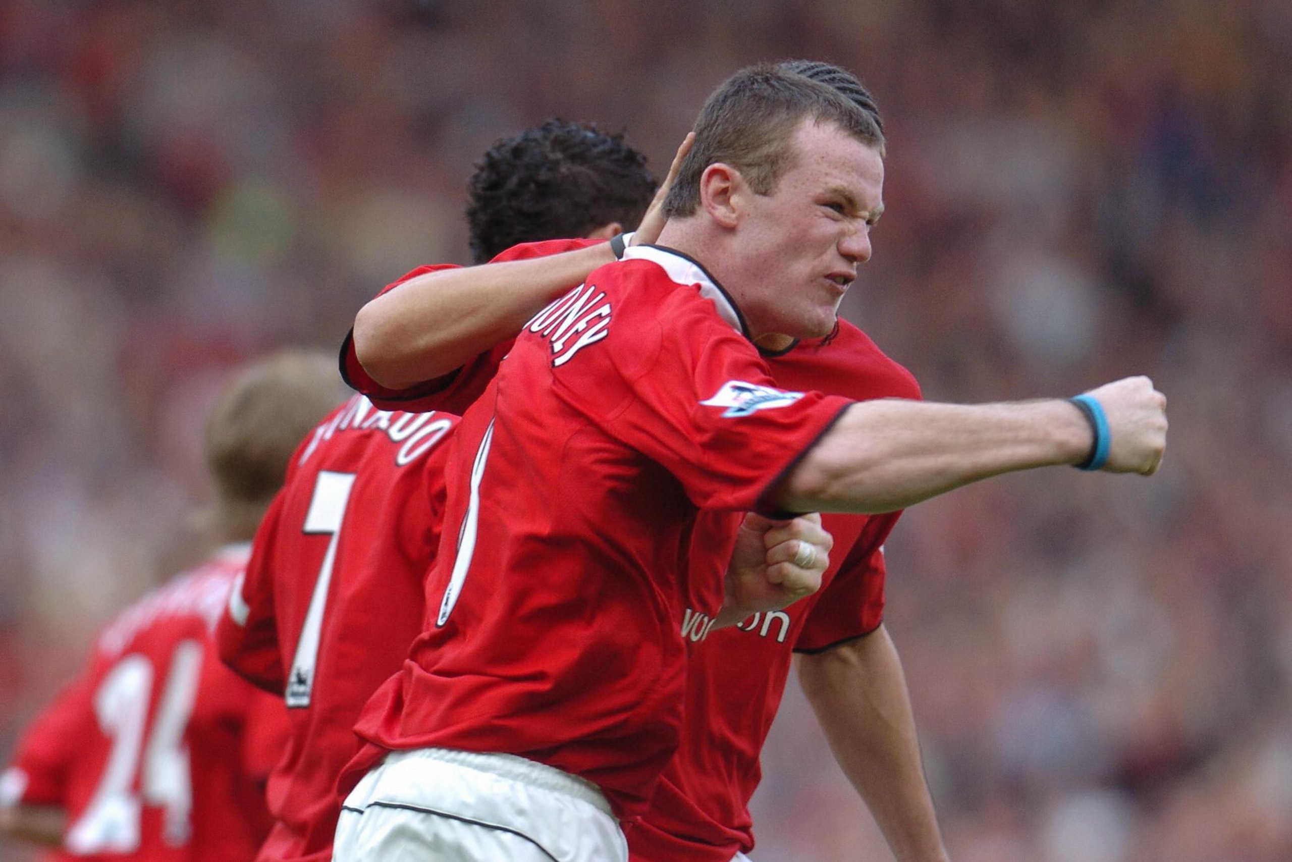 MANCHESTER, UNITED KINGDOM:  Manchester United's Wayne Rooney celebrates after scoring to make it 1-1 against Newcastle during a Premiereship match at Old Trafford, Manchester, United Kingdom 24 April 2005. AFP Photo by Paul Barker  (Photo credit should r