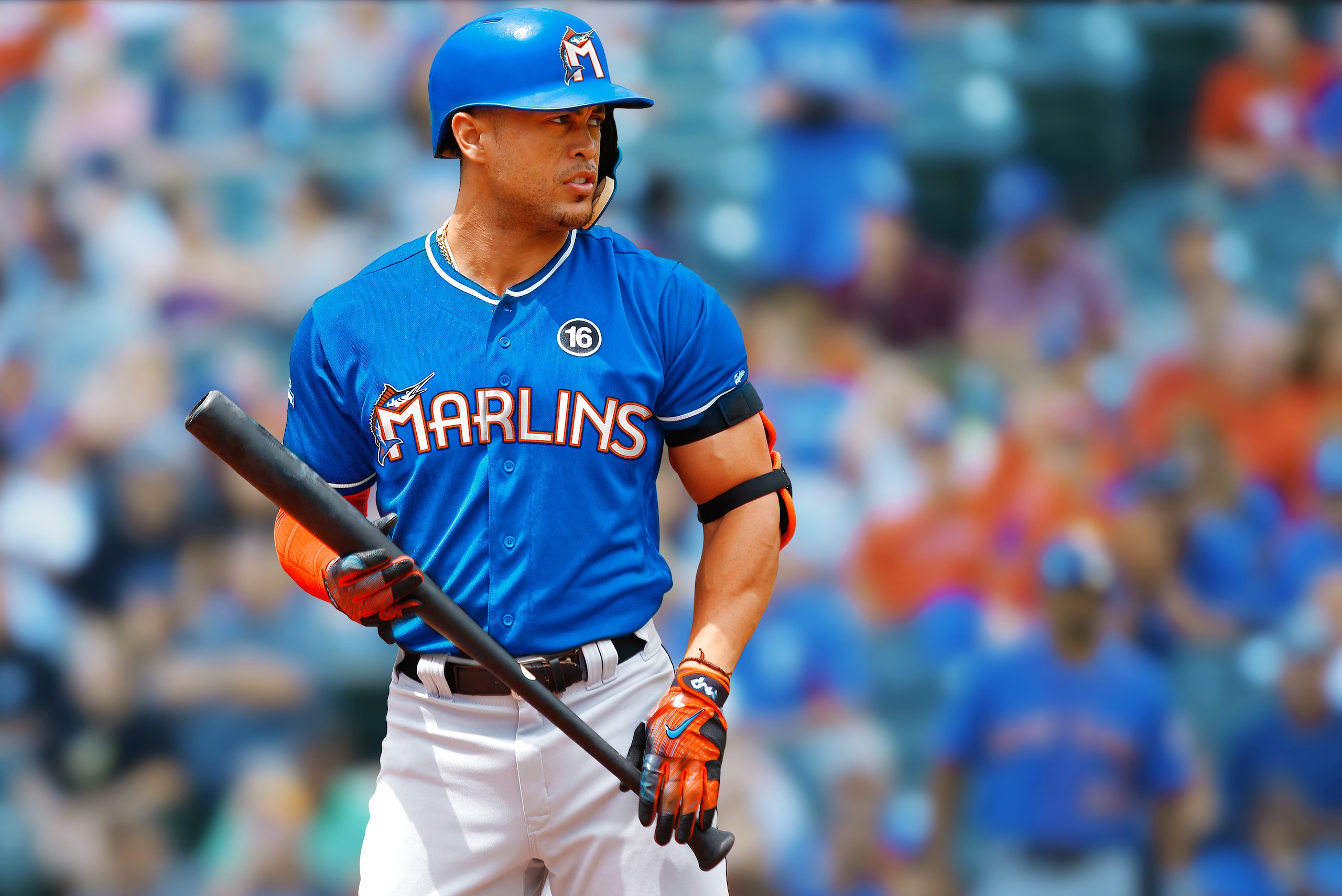 Giancarlo Stanton in a redesigned Marlins uniform that embraces blue accents and brings back the fish. Giancarlo Stanton in a redesigned Marlins uniform that embraces blue accents and brings back the fish.