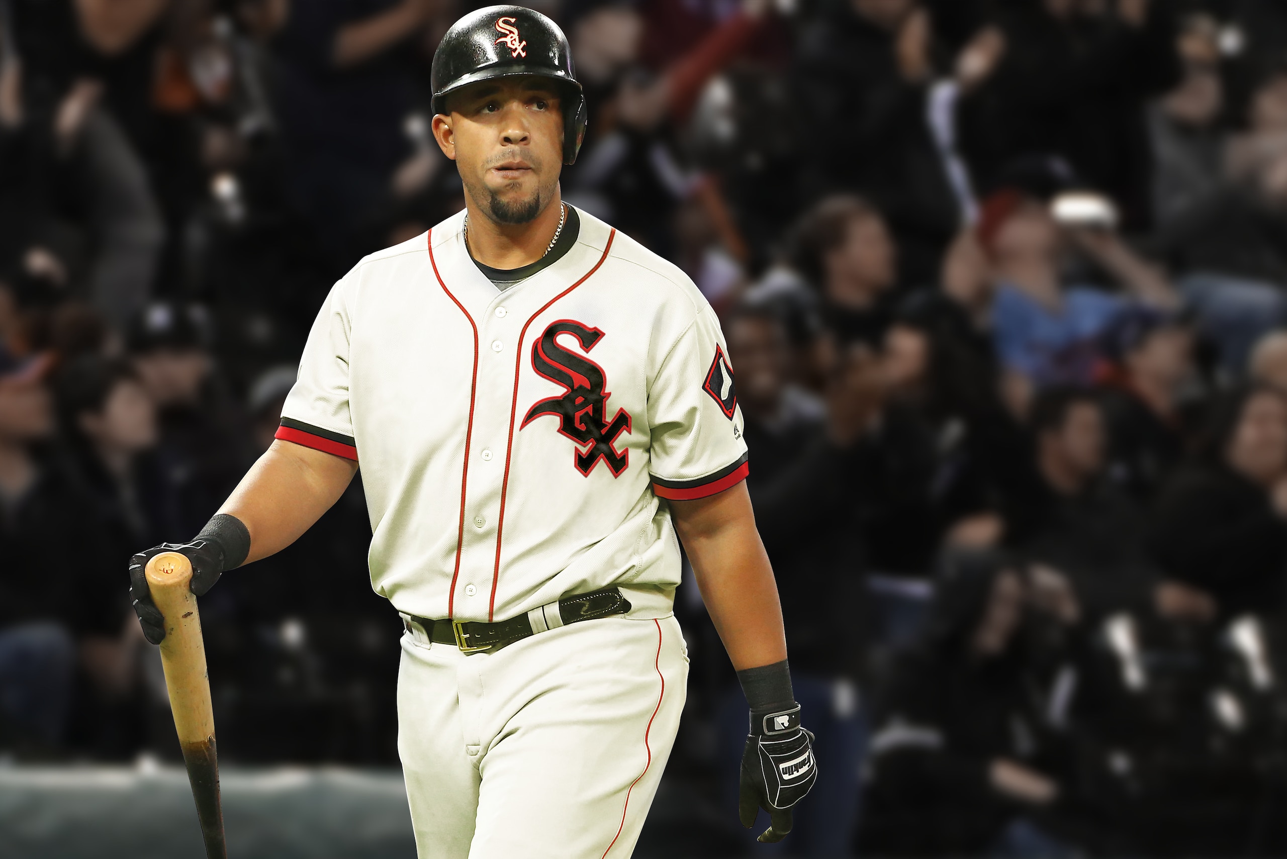 Jose Abreu in a redesigned White Sox uniform with hints of red and cream. Jose Abreu in a redesigned White Sox uniform with hints of red and cream.