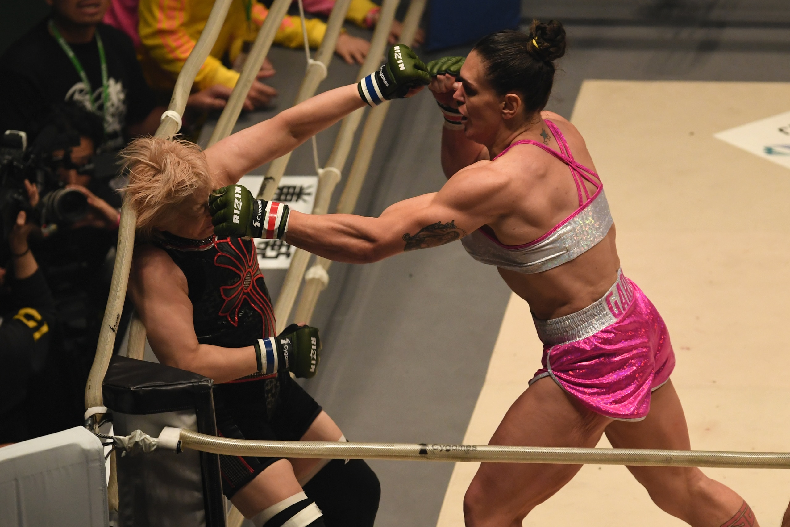 SAITAMA, JAPAN - DECEMBER 31:  Gabi Garcia of Brazil punches Yumiko Hotta of Japan in the bout during the RIZIN Fighting World GP 2016 final round at Saitama Super Arena on December 31, 2016 in Saitama, Japan.  (Photo by Etsuo Hara/Getty Images)