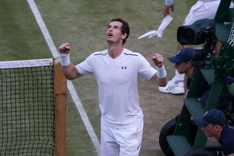 Britain's Andy Murray celebrates beating Italy's Fabio Fognini during their men's singles third round match on the fifth day of the 2017 Wimbledon Championships at The All England Lawn Tennis Club in Wimbledon, southwest London, on July 7, 2017. / AFP PHO