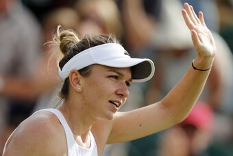 Romania's Simona Halep reacts after winning against China's Peng Shuai during their women's singles third round match on the fifth day of the 2017 Wimbledon Championships at The All England Lawn Tennis Club in Wimbledon, southwest London, on July 7, 2017.