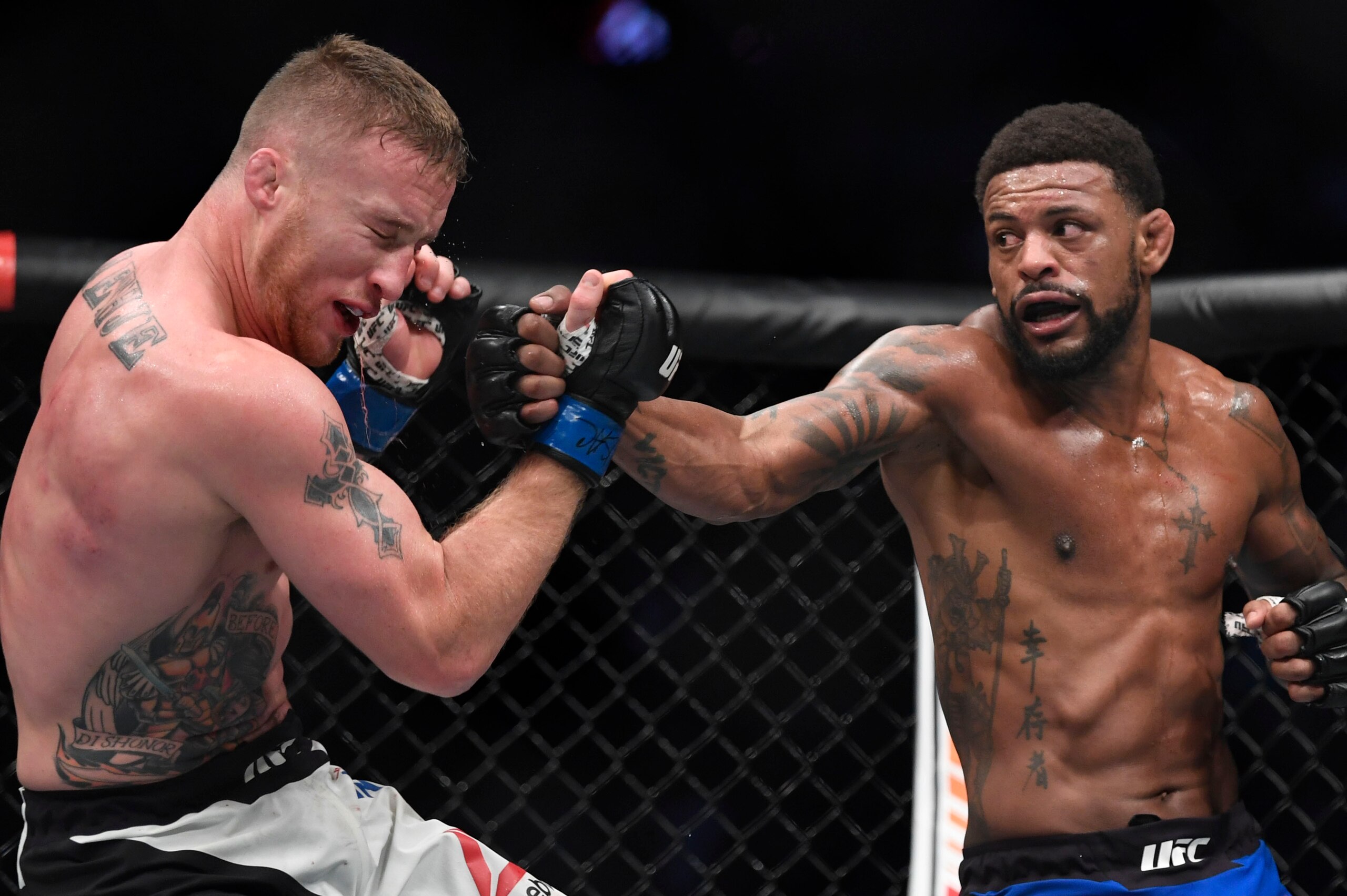 July 7, 2017; Las Vegas, NV, USA; Michael Johnson (red gloves) fights Justin Gaethje (blue gloves) during The Ultimate Fighter Finale at T-Mobile Arena. Mandatory Credit: Kyle Terada-USA TODAY Sports July 7, 2017; Las Vegas, NV, USA; Michael Johnson (red gloves) fights Justin Gaethje (blue gloves) during The Ultimate Fighter Finale at T-Mobile Arena. Mandatory Credit: Kyle Terada-USA TODAY Sports