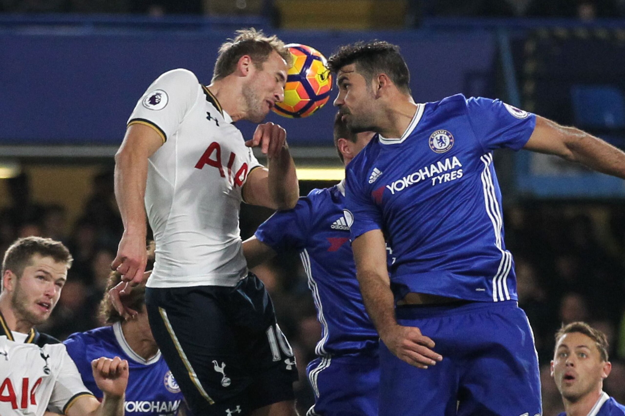 Tottenham Hotspur's English striker Harry Kane (CL) and Chelsea's Brazilian-born Spanish striker Diego Costa (CR) go up for a header during the English Premier League football match between Chelsea and Tottenham Hotspur at Stamford Bridge in London on Nov