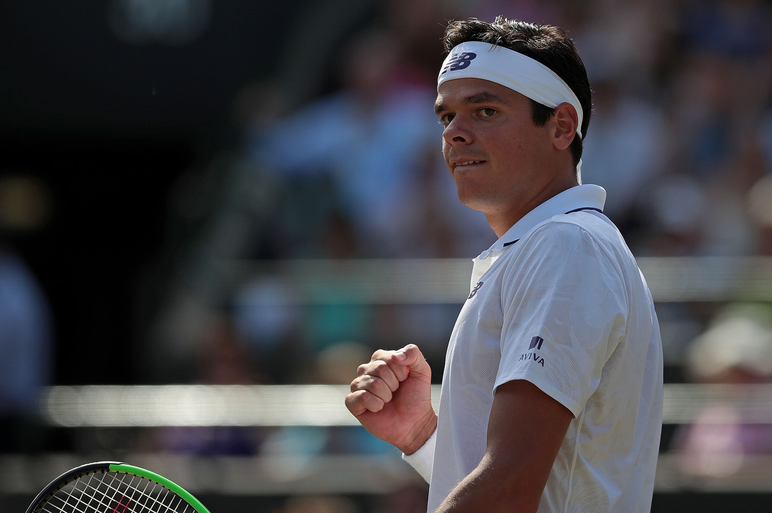 Canada's Milos Raonic reacts after winning against Spain's Albert Ramos-Vinolas during their men's singles third round match on the sixth day of the 2017 Wimbledon Championships at The All England Lawn Tennis Club in Wimbledon, southwest London, on July 8