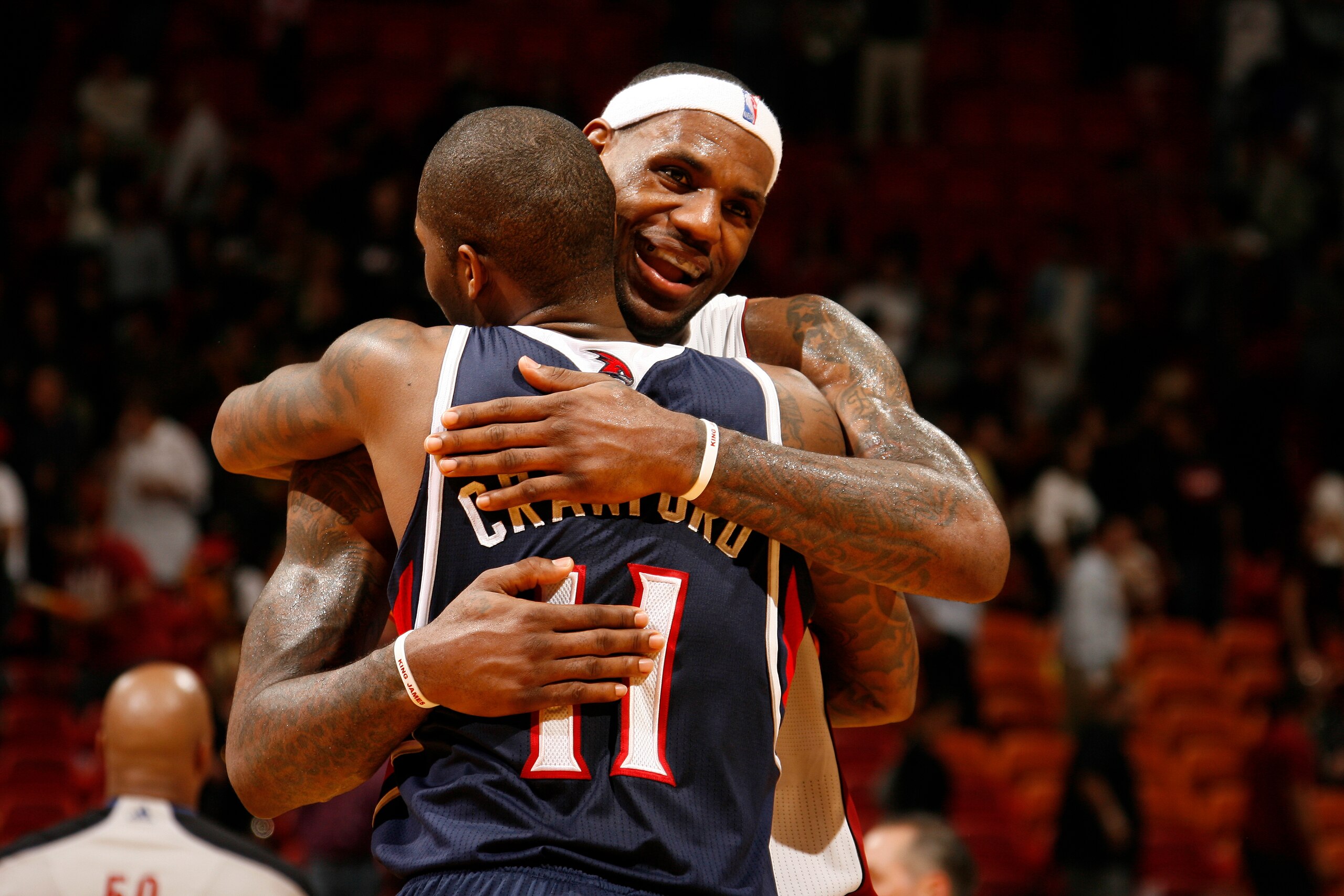 MIAMI - JANUARY 18: LeBron James #6 of the Miami Heat congratulates Jamal Crawford #11 of the Atlanta Hawks on January 18, 2011 at American Airlines Arena in Miami, Florida. NOTE TO USER: User expressly acknowledges and agrees that, by downloading and/or 