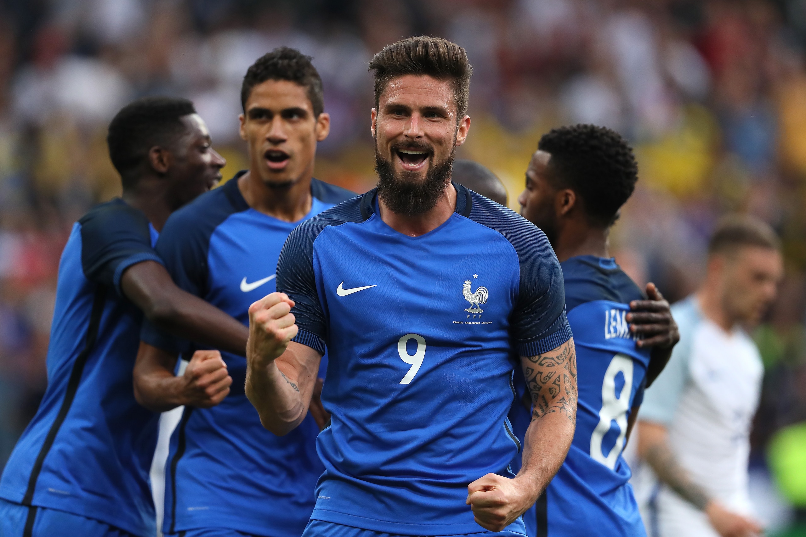 PARIS, FRANCE - JUNE 13:   Olivier Giroud of France celebrates after Samuel Umtiti of France scored a goal to make the score 1-1 during the International Friendly match between France and England at Stade de France on June 13, 2017 in Paris, France.  (Pho
