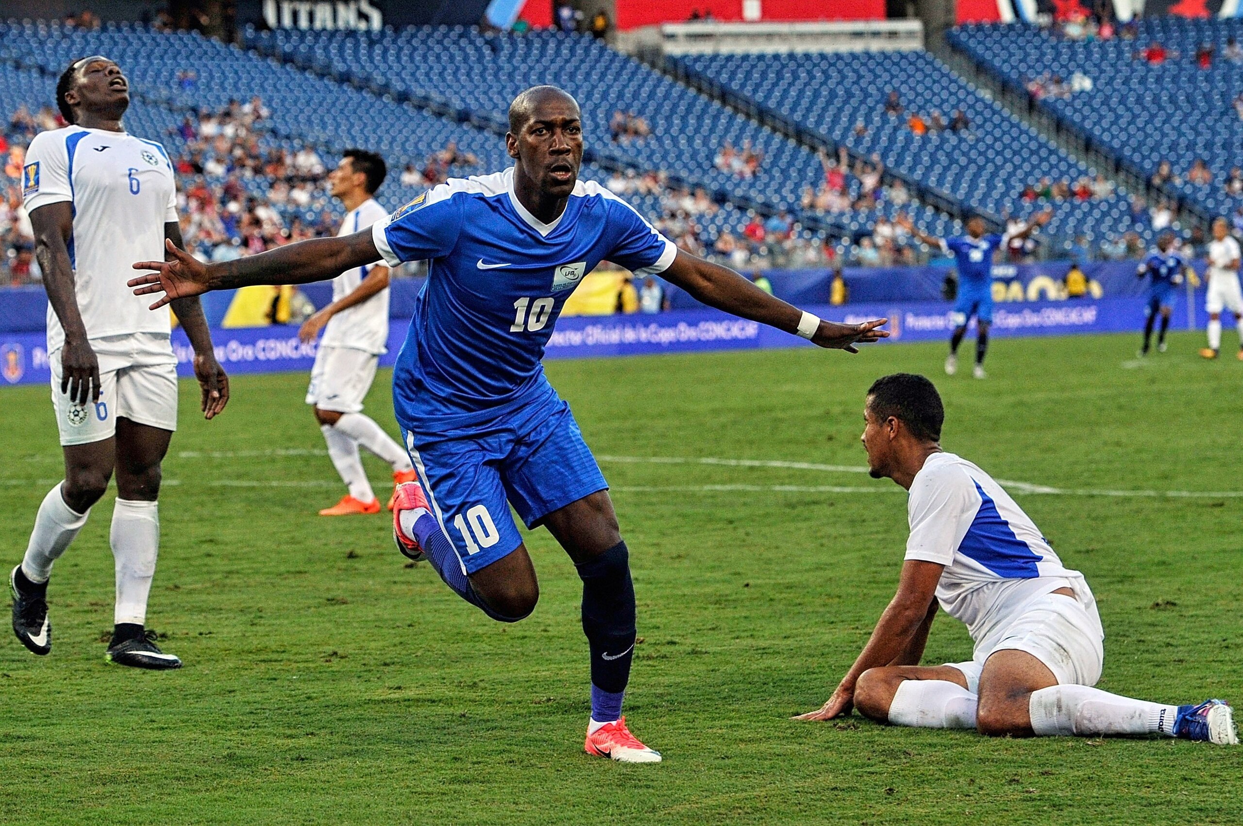 NASHVILLE, TN - JULY 08:  Steeven Langil #10 of Martinique celebrates after scoring a goal against Nicaragua during the second half of a CONCACAF Gold Cup Soccer match at Nissan Stadium on July 8, 2017 in Nashville, Tennessee.  (Photo by Frederick Breedon