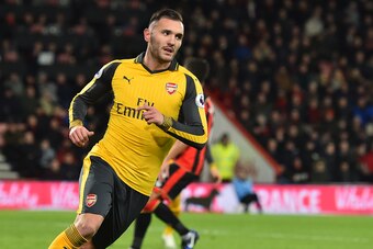 Arsenal's Spanish striker Lucas Perez celebrates after scoring their second goal during the English Premier League football match between Bournemouth and Arsenal at the Vitality Stadium in Bournemouth, southern England on January 3, 2017. / AFP / Glyn KIR