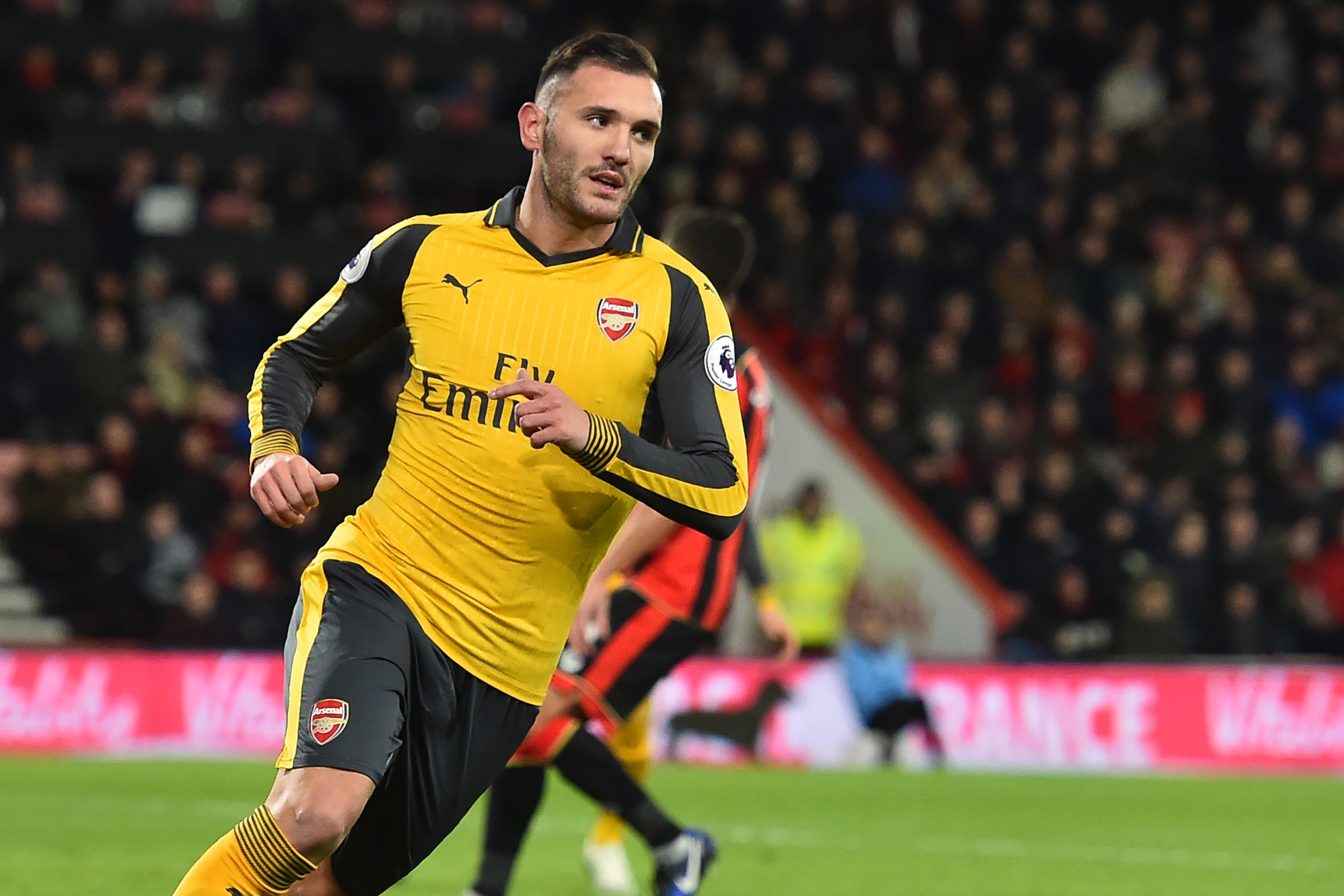 Arsenal's Spanish striker Lucas Perez celebrates after scoring their second goal during the English Premier League football match between Bournemouth and Arsenal at the Vitality Stadium in Bournemouth, southern England on January 3, 2017. / AFP / Glyn KIR