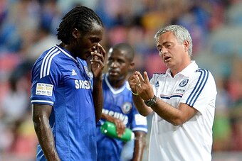 BANGKOK, THAILAND - JULY 17: Manager Jose Mourinho of Chelsea FC talking with Romelu Lukaku during the international friendly match between Chelsea FC and the Singha Thailand All-Star XI on July 17, 2013 in Bangkok, Thailand.  (Photo by Thananuwat Srirasa