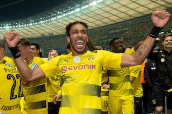 BERLIN, GERMANY - MAY 27: Pierre-Emerick Aubameyang of Dortmund celebrates after winning the DFB Cup final match between Eintracht Frankfurt and Borussia Dortmund at Olympiastadion on May 27, 2017 in Berlin, Germany. (Photo by TF-Images/Getty Images) BERLIN, GERMANY - MAY 27: Pierre-Emerick Aubameyang of Dortmund celebrates after winning the DFB Cup final match between Eintracht Frankfurt and Borussia Dortmund at Olympiastadion on May 27, 2017 in Berlin, Germany. (Photo by TF-Images/Getty Images)