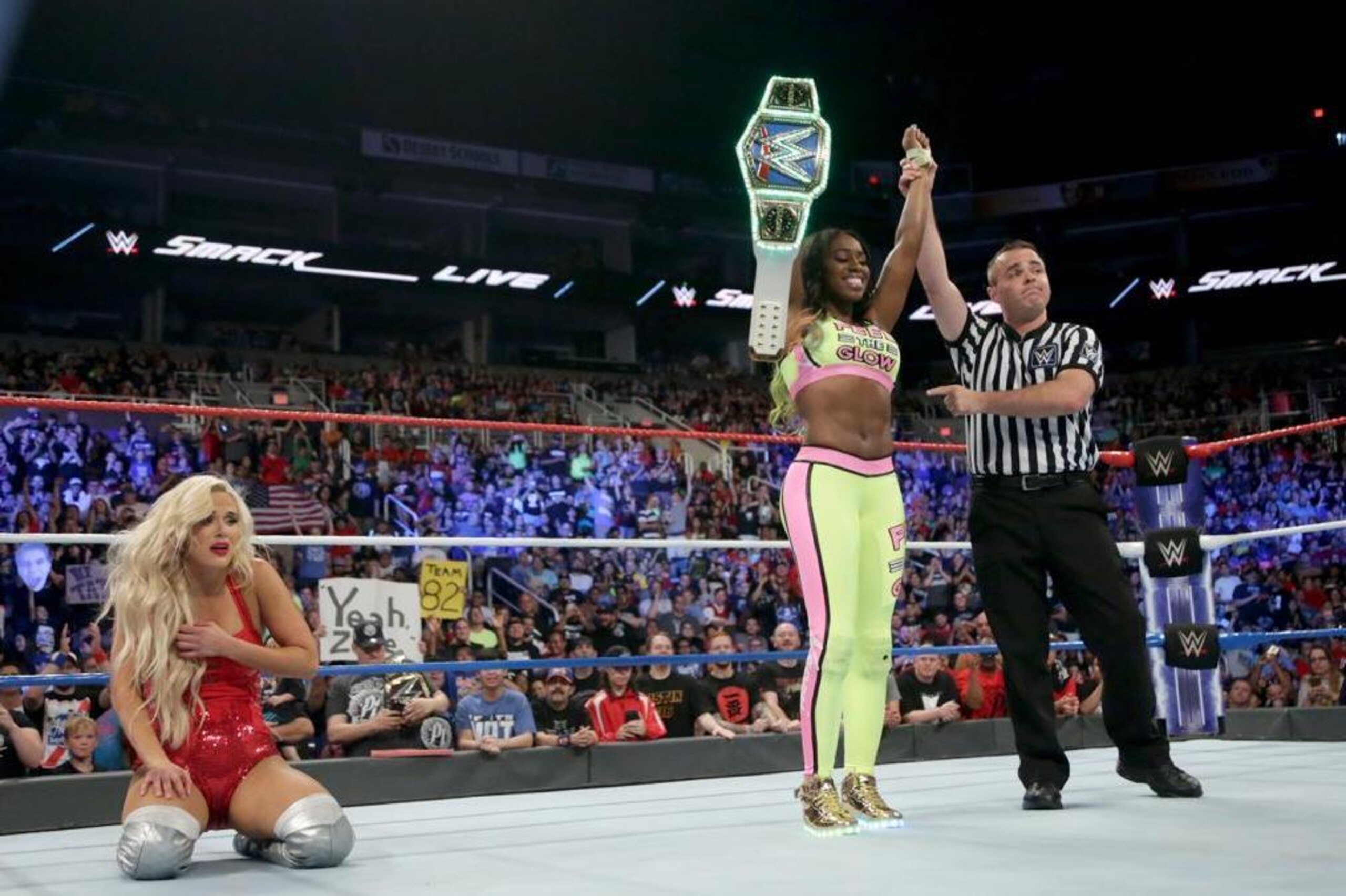 Naomi celebrates her latest win over Lana.