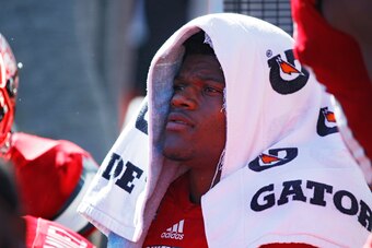 ORLANDO, FL - DECEMBER 31: Lamar Jackson #8 of the Louisville Cardinals looks on against the LSU Tigers during the Buffalo Wild Wings Citrus Bowl at Camping World Stadium on December 31, 2016 in Orlando, Florida. LSU defeated Louisville 29-9. (Photo by Jo