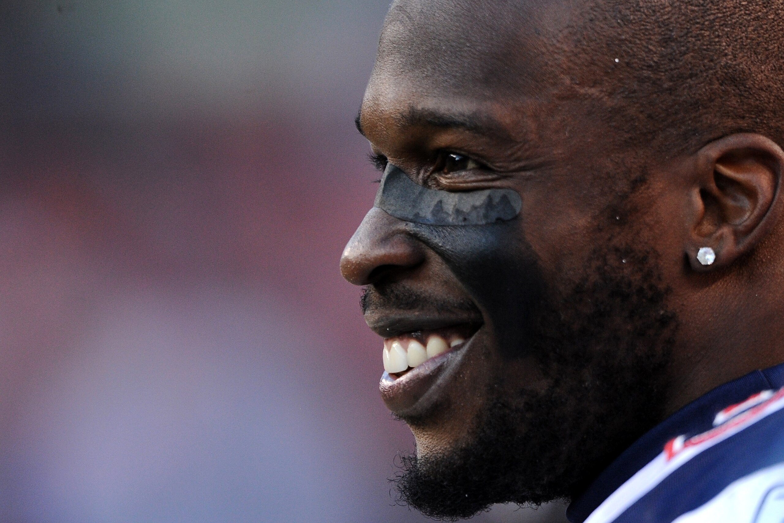 DENVER, CO - DECEMBER 18: Wide receiver Chad Ochocinco #85 of the New England Patriots looks on at play against the Denver Broncos at Sports Authority Field at Mile High on December 18, 2011 in Denver, Colorado. The New England Patriots won, 41-23. (Photo
