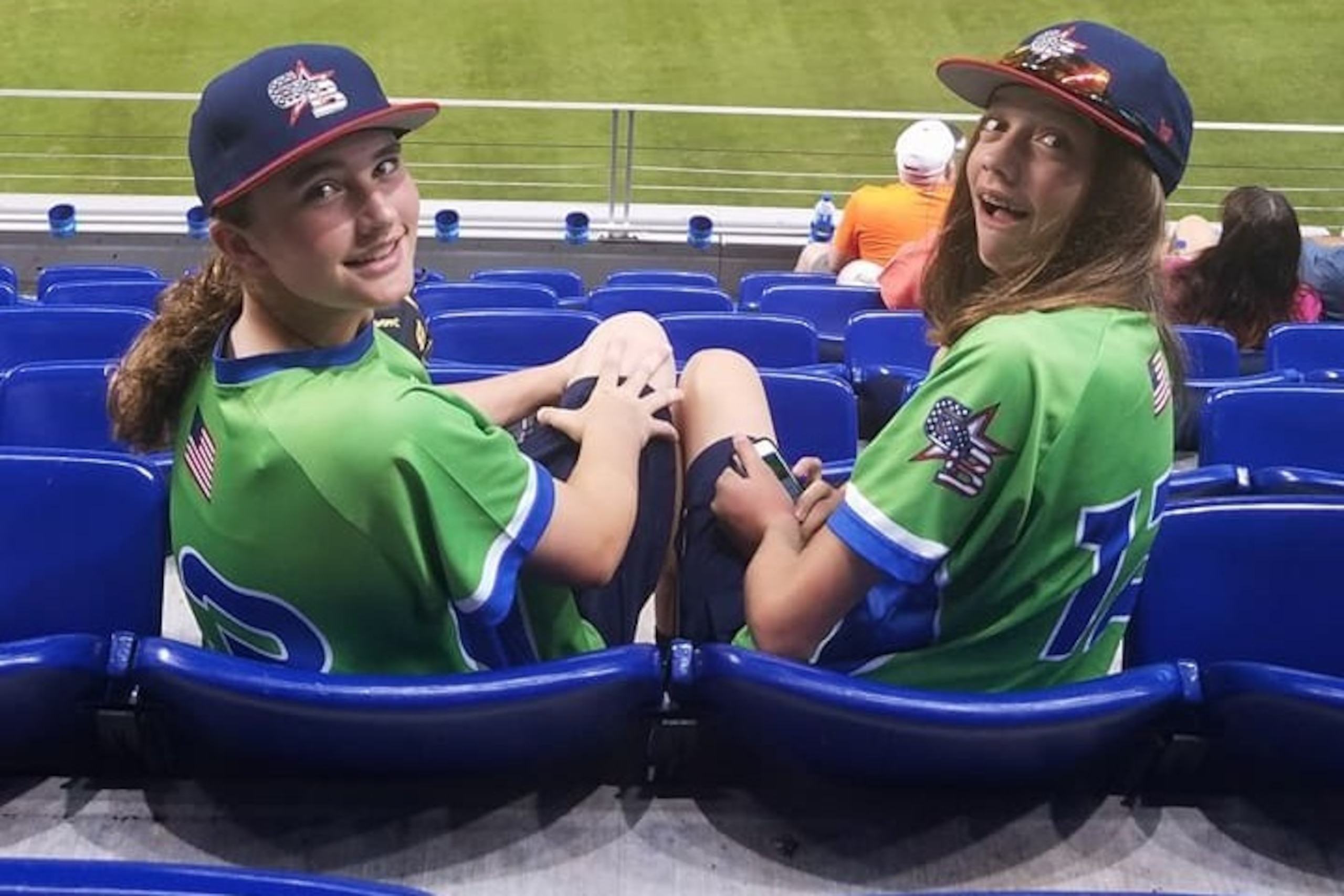Gianna (left) and Grace DeVinney (right) have formed a friendship through the GTB. Grace's father, Josh, is the director of baseball of operations for the team.
