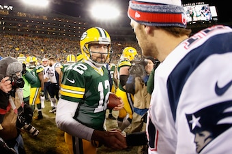 GREEN BAY, WI - NOVEMBER 30:  Quarterbacks Aaron Rodgers #12 of the Green Bay Packers and Tom Brady #12 of the New England Patriots shake hands following the NFL game at Lambeau Field on November 30, 2014 in Green Bay, Wisconsin. The Packers defeated the 