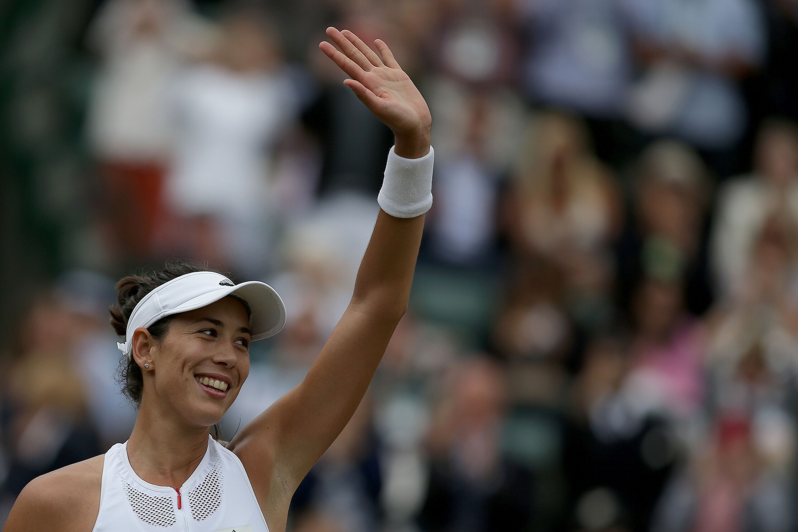 Spain's Garbine Muguruza reacts after winning against Russia's Svetlana Kuznetsova during their women's singles quarter-final match on the eighth day of the 2017 Wimbledon Championships at The All England Lawn Tennis Club in Wimbledon, southwest London, o
