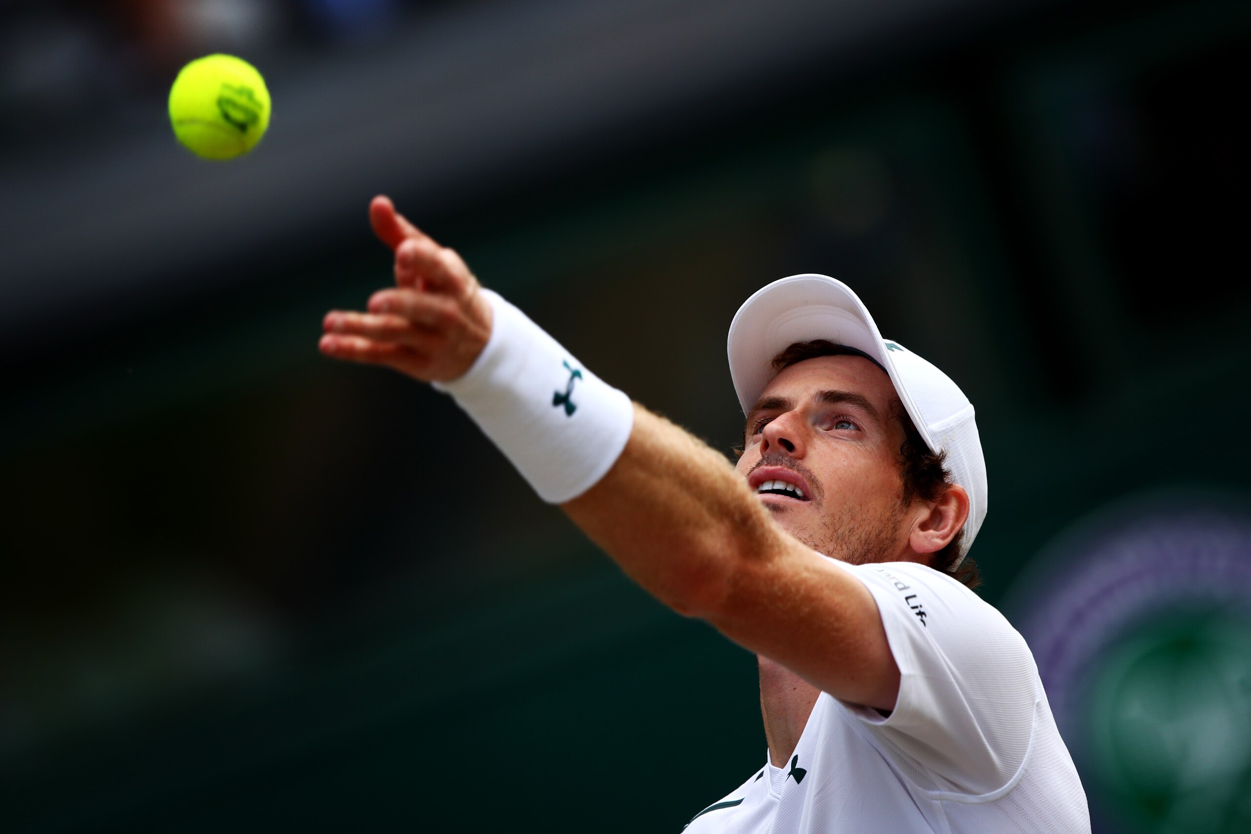 LONDON, ENGLAND - JULY 12:  Andy Murray of Great Britain serves during the Gentlemen's Singles quarter final match against Sam Querrey of The United States on day nine of the Wimbledon Lawn Tennis Championships at the All England Lawn Tennis and Croquet C