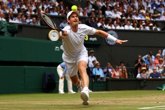 LONDON, ENGLAND - JULY 12:  Andy Murray of Great Britain plays a forehand during the Gentlemen's Singles quarter final match against   Sam Querrey of The United States on day nine of the Wimbledon Lawn Tennis Championships at the All England Lawn Tennis a